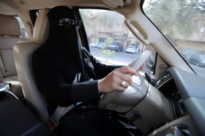 A Saudi woman, Amira, who works in Aramco, drives to her office in Dammam, Saudi Arabia Saudi woman