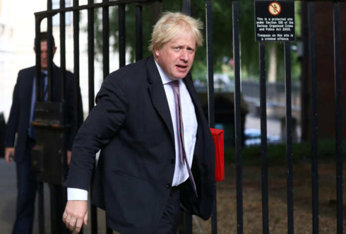 FILE PHOTO: Britain's Secretary of State for Foreign and Commonwealth Affairs Boris Johnson arrives at 10 Downing Street in London