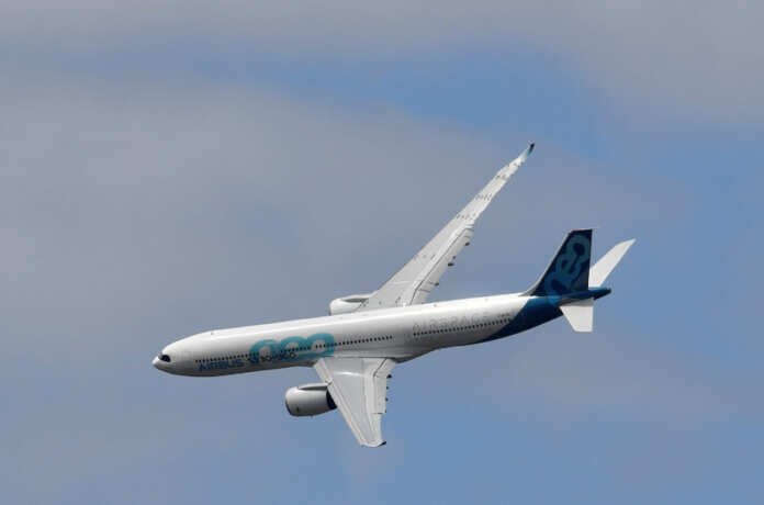 An Airbus A330 passenger plane is seen during a flying display at Farnborough International Airshow in Farnborough, Britain