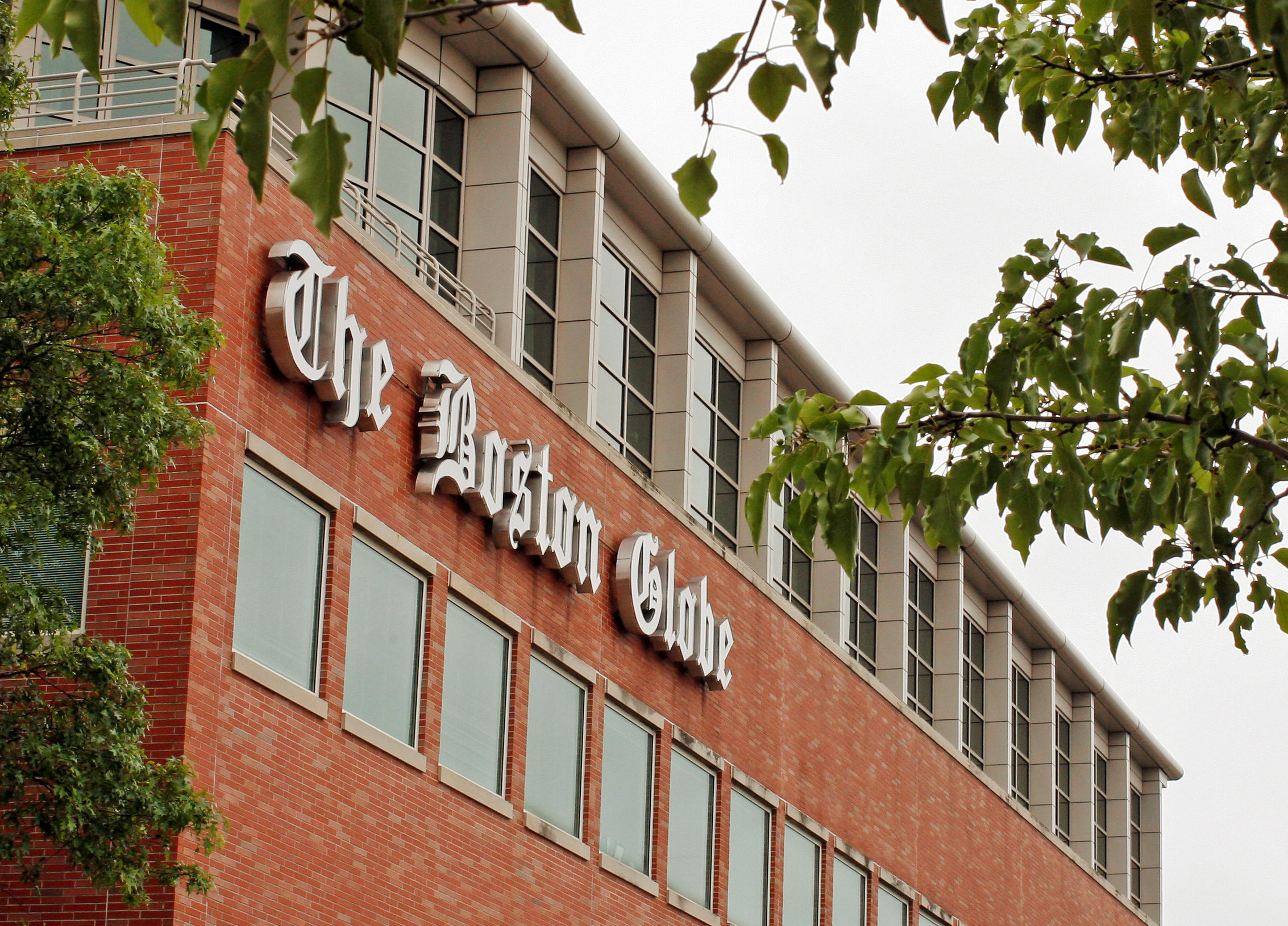 FILE PHOTO: Boston Globe's logo is seen on newspaper's building in Boston