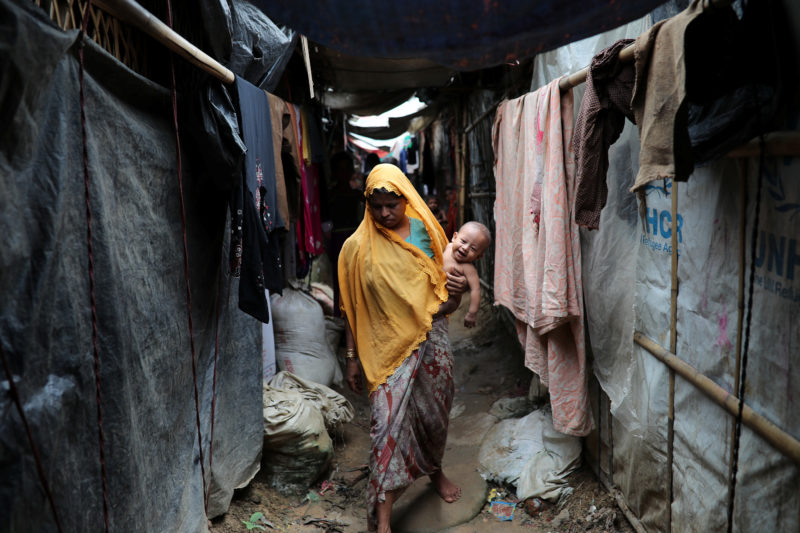 Rashida Begum, a Rohingya refugee woman walks on the Kutupalong camp in Cox's Bazar
