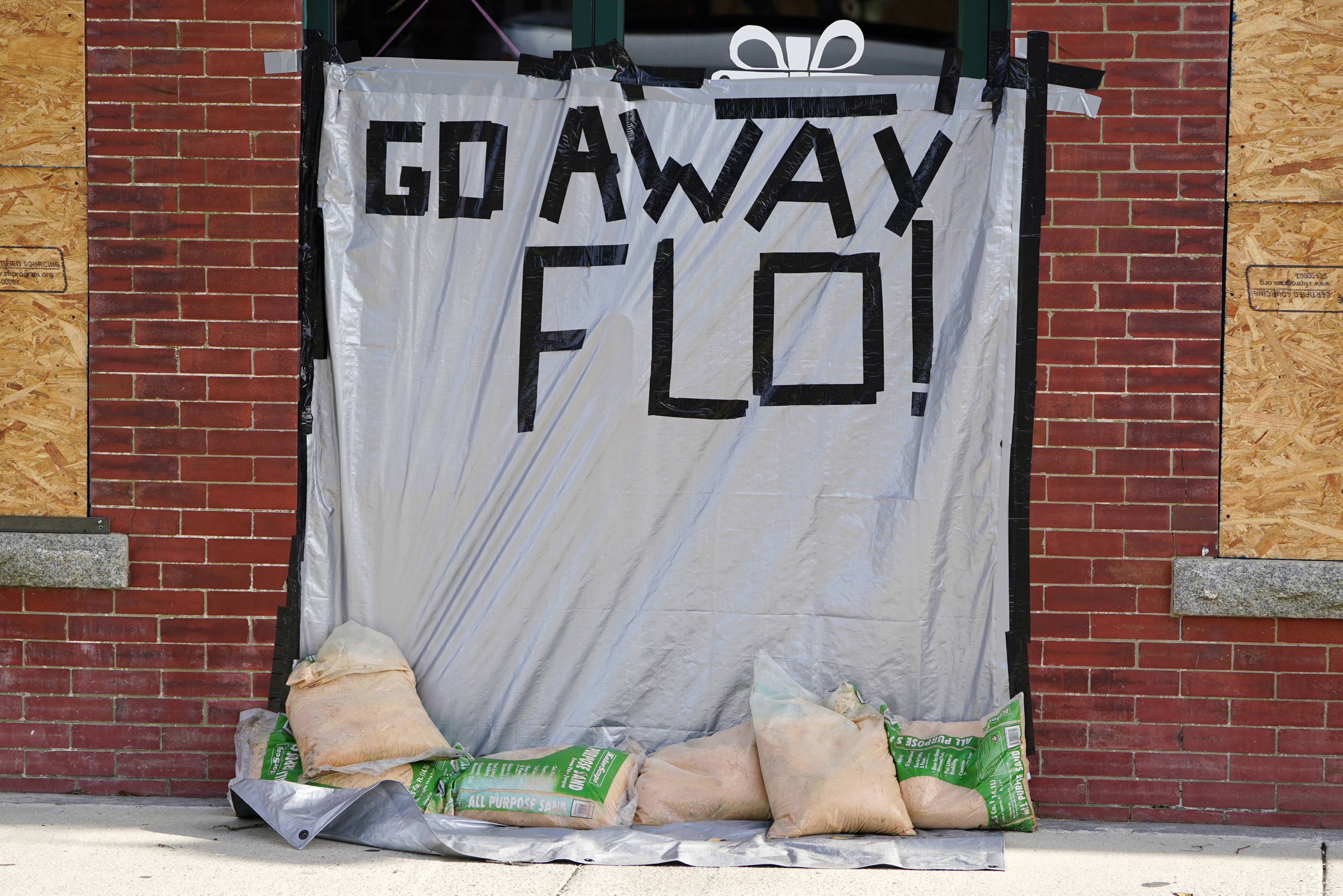 A message is posted on a boarded up building before the arrival of Hurricane Florence on Oak Island