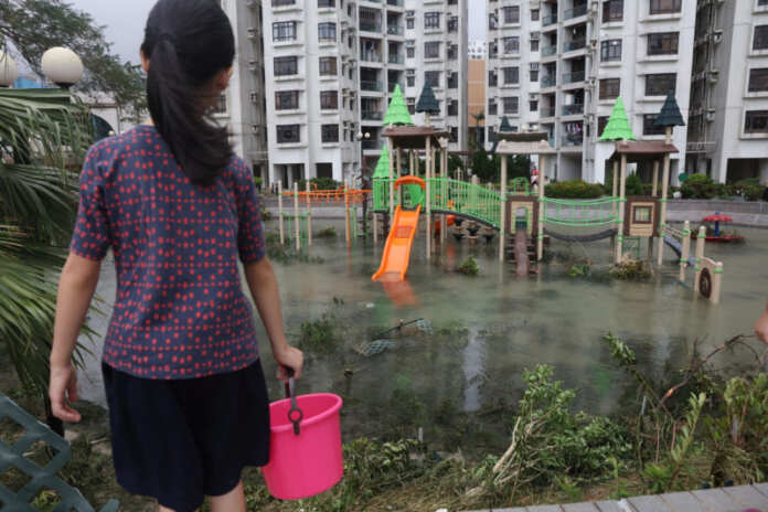 A park is flooded by seawater after Typhoon Mangkhut hit Hong Kong