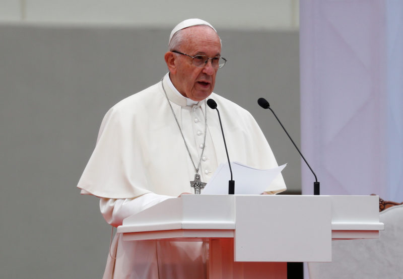 Pope Francis addresses at the front of the Presidential palace in Vilnius