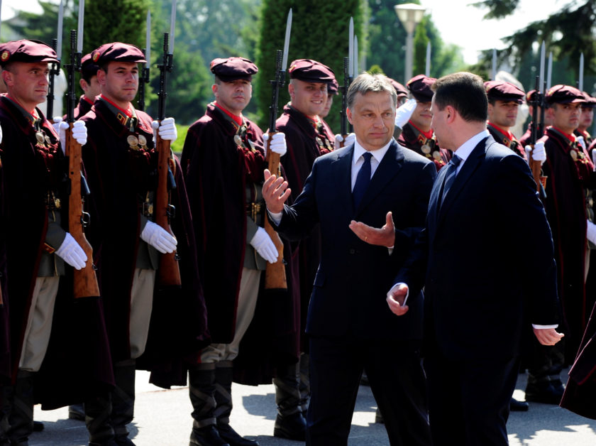 FILE PHOTO: Macedonian Prime Minister Nikola Gruevski and his Hungarian counterpart Viktor Orban review a military guard of honor in Skopje