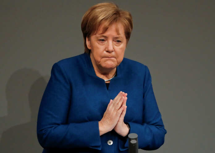 German Chancellor Angela Merkel speaks during a session at the lower house of parliament Bundestag in Berlin