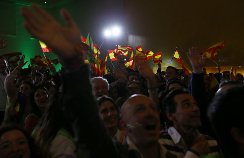 Supporters of Spain's far-right VOX party celebrate results after the Andalusian regional elections in Seville