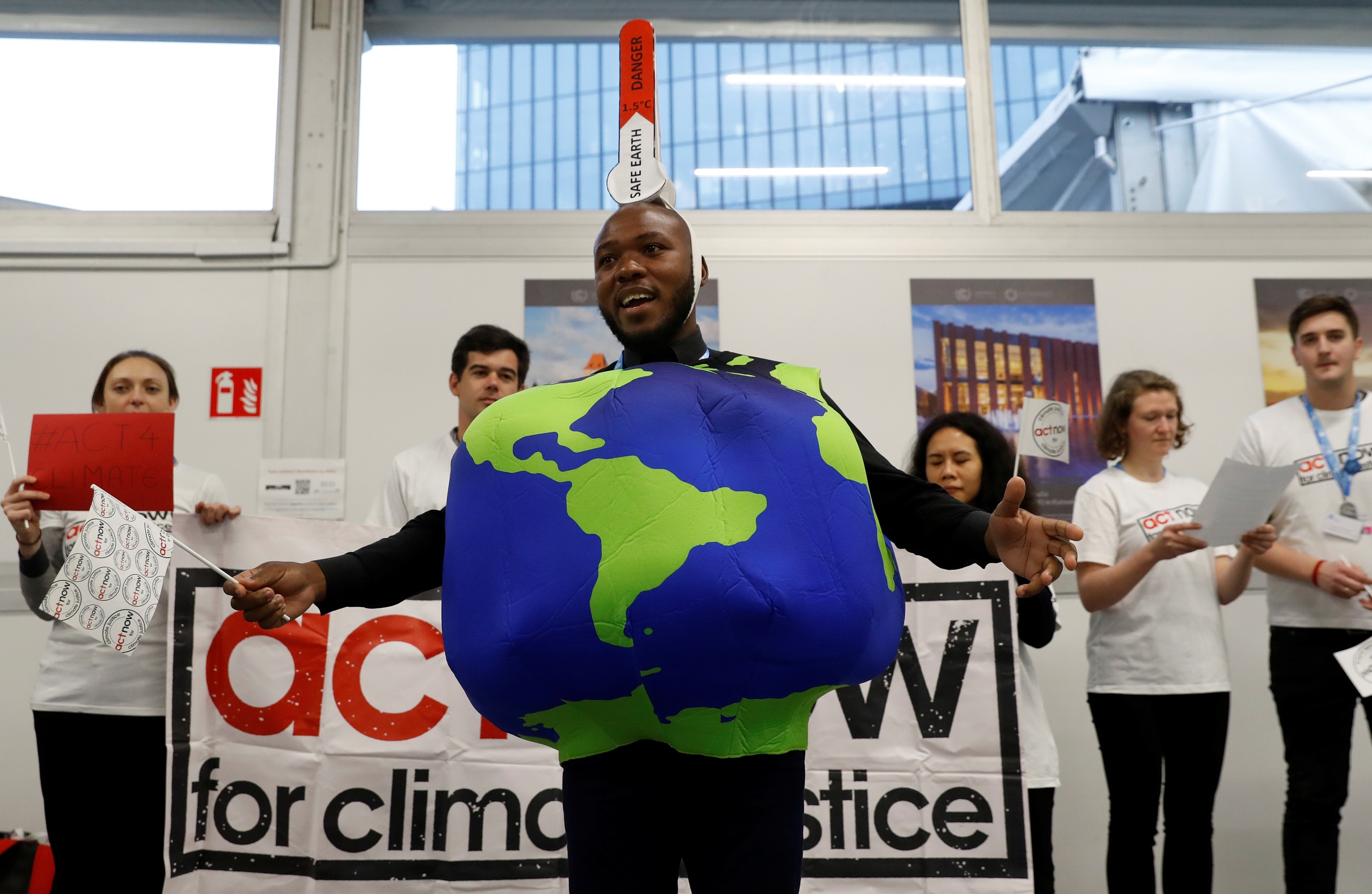 Environmental activists demonstrate at COP24 in Katowice