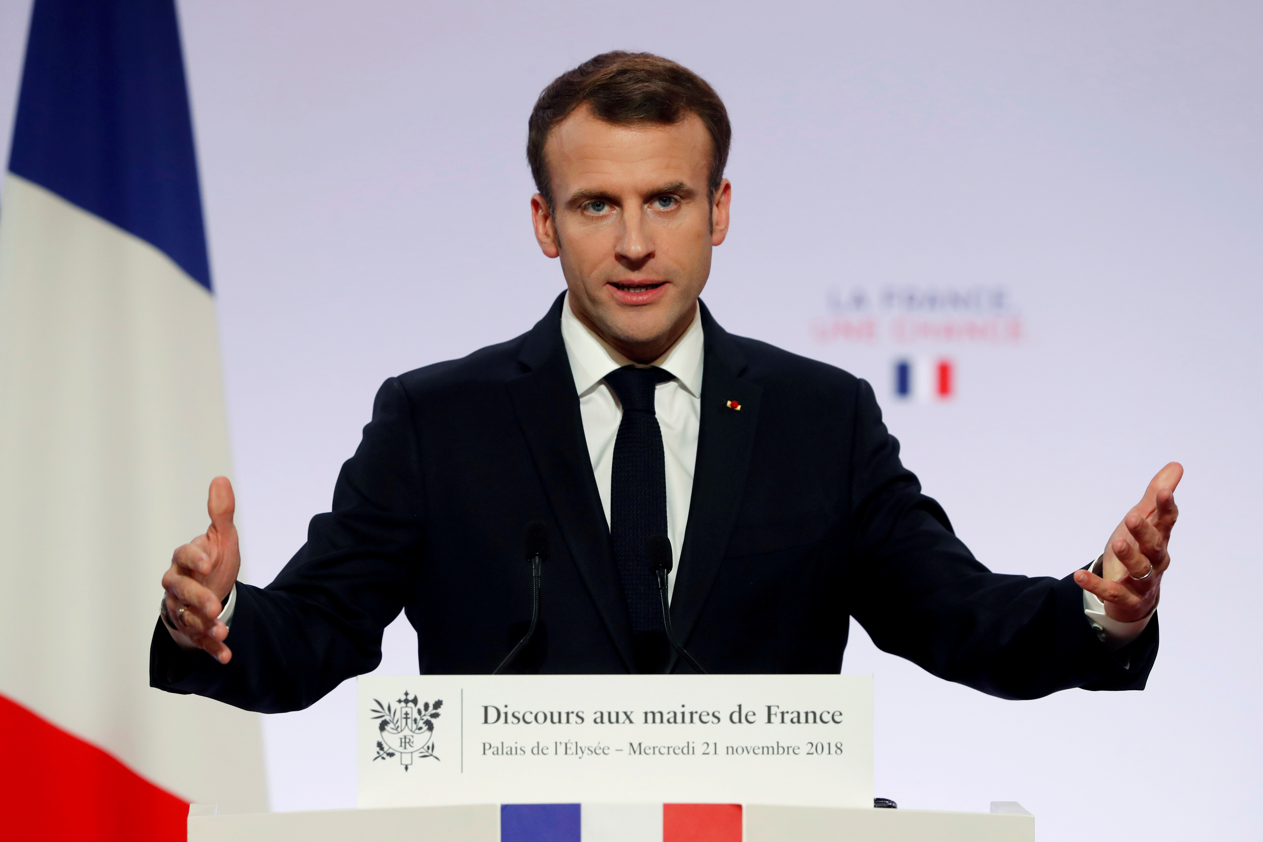 FILE PHOTO: France's President Emmanuel Macron delivers a speech during a meeting with French mayors at the Elysee Palace, in Paris