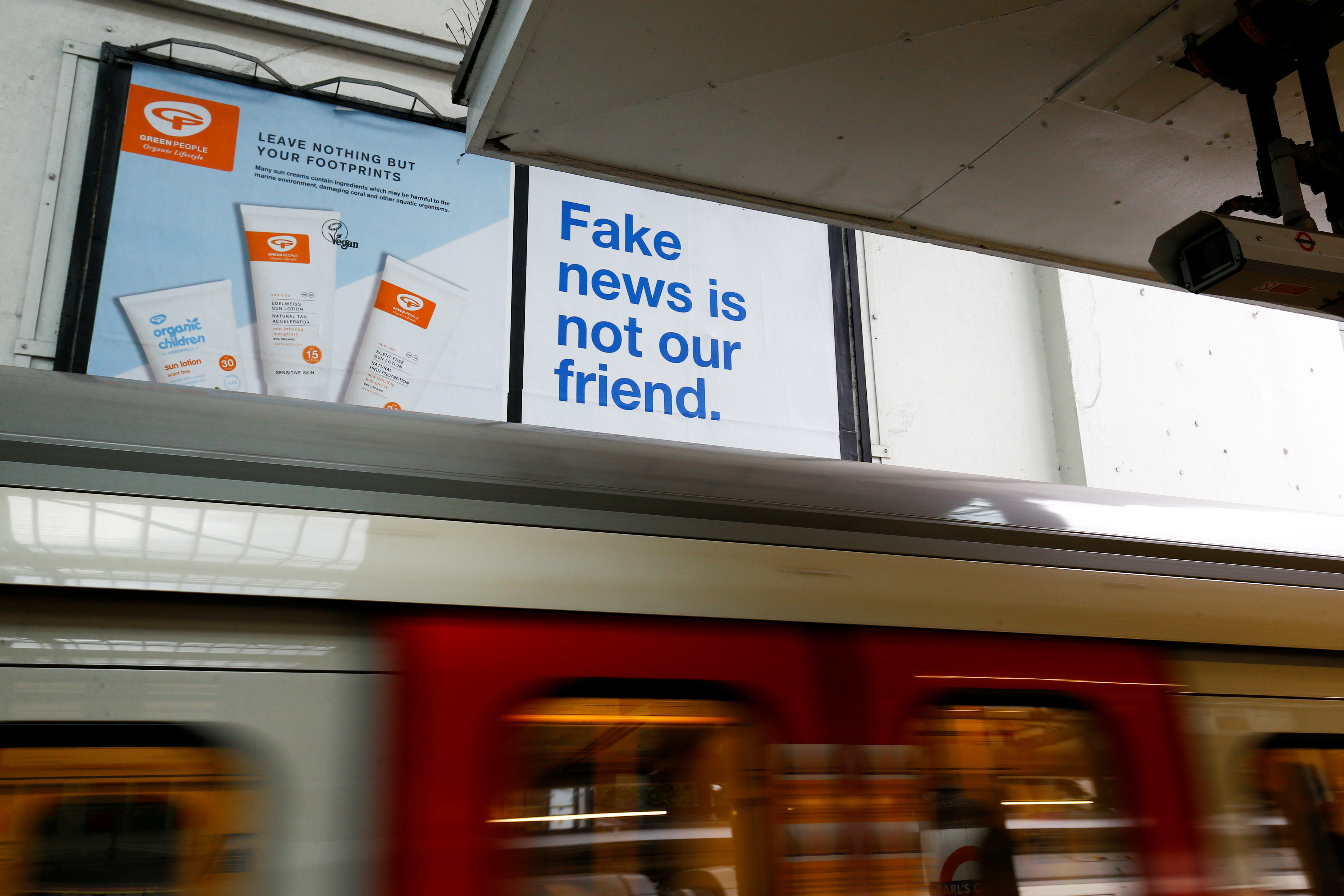FILE PHOTO: A Facebook billboard advert can be seen at Earls Court underground station in London