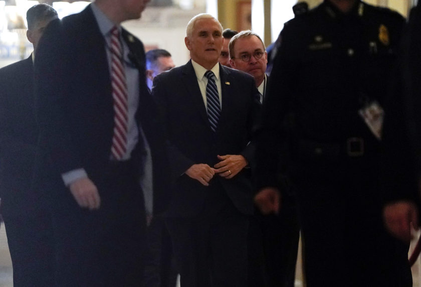U.S. Vice President Mike Pence and Acting White House Chief of Staff Mick Mulvaney arrive at the U.S. Capitol on the first day of a partial federal government shutdown in Washington