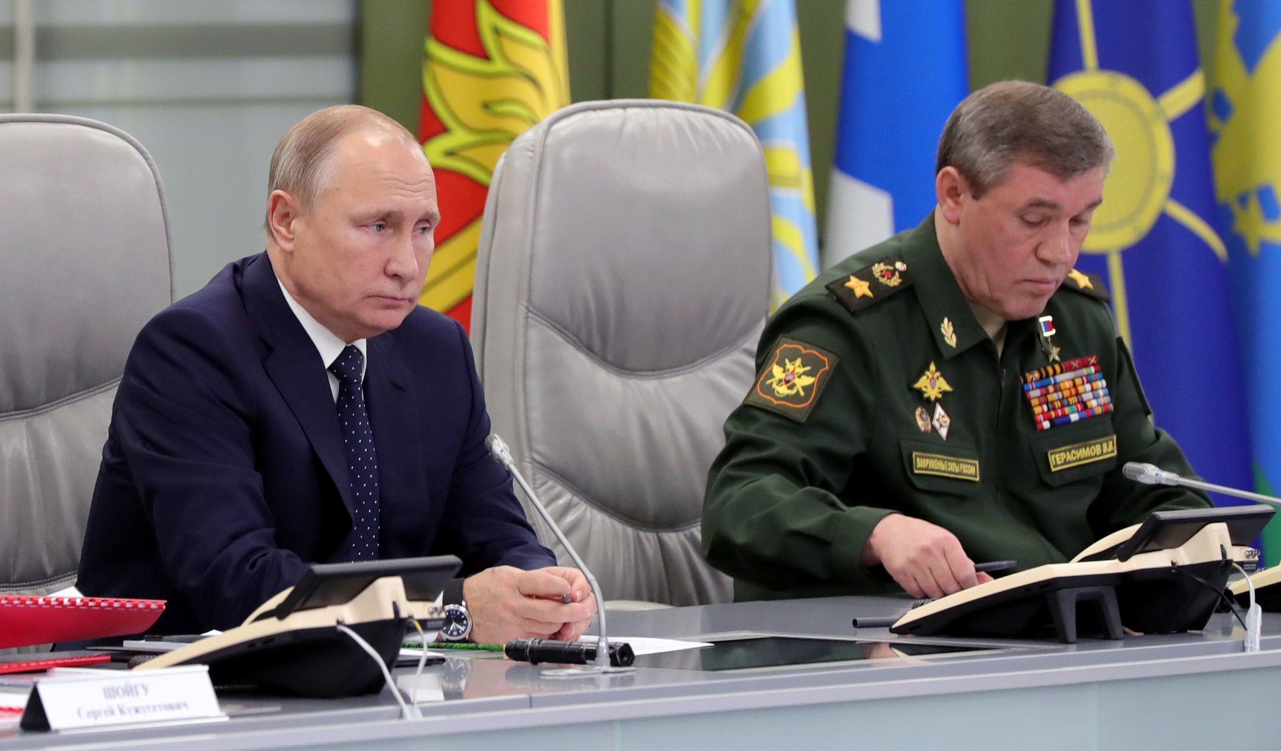Russian President Vladimir Putin visits the National Defence Control Centre in Moscow