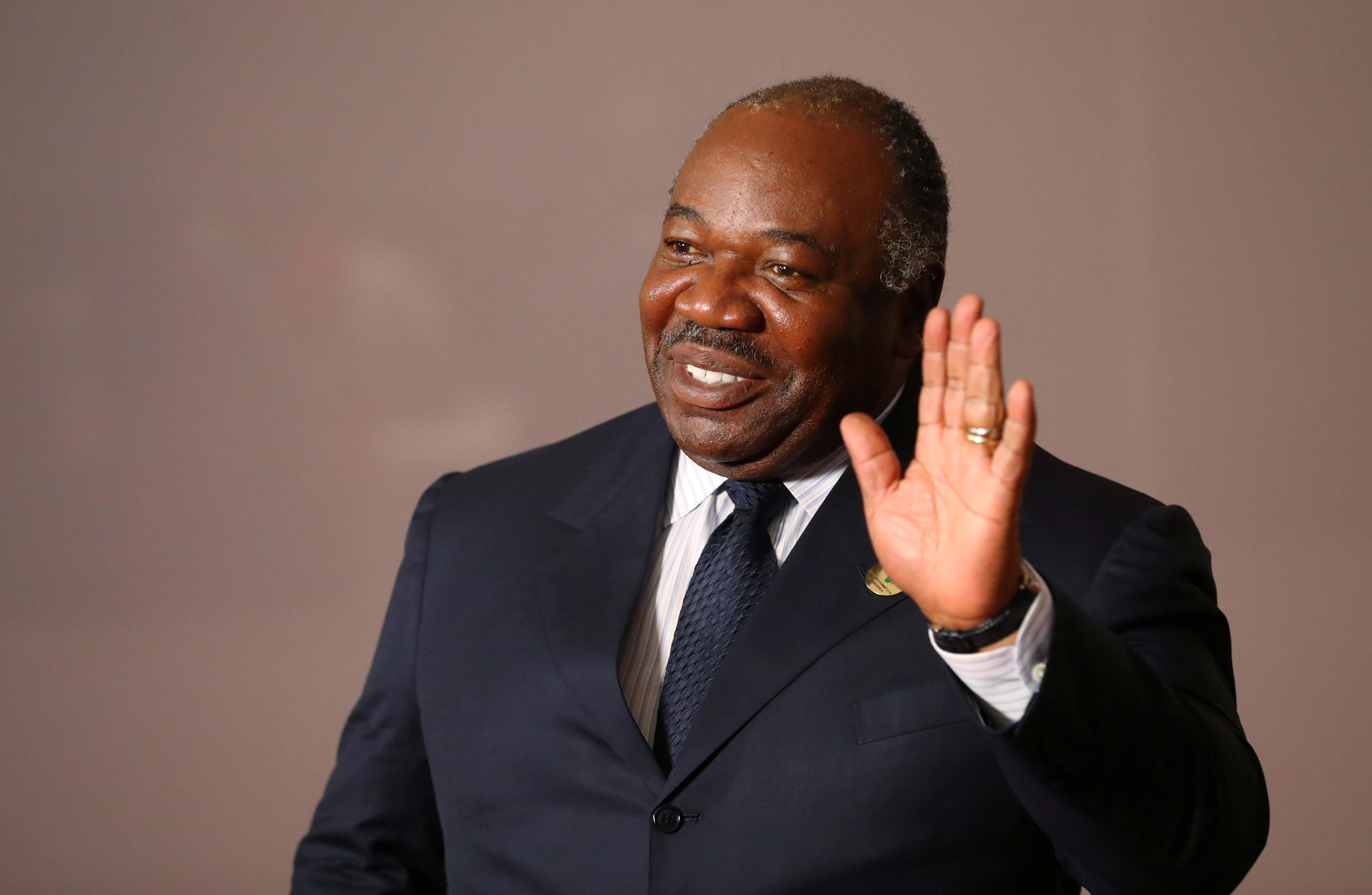 FILE PHOTO - Gabonese President Ali Bongo Ondimba arrives for a group picture at the BRICS summit meeting in Johannesburg