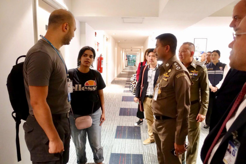 FILE PHOTO - Saudi teen Rahaf Mohammed al-Qunun is greeted by Thai immigration authorities at a hotel inside Suvarnabhumi Airport in Bangkok