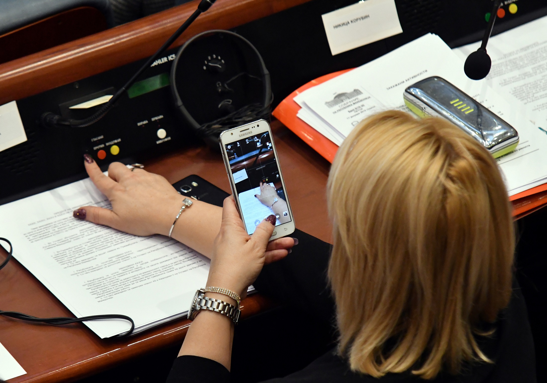 Deputies of the Macedonian parliament vote to pass constitutional changes in Skopje
