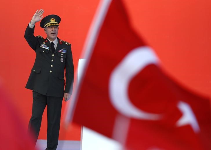 Turkey's Chief of the General Staff Akar greets audience during the Democracy and Martyrs Rally in Istanbul
