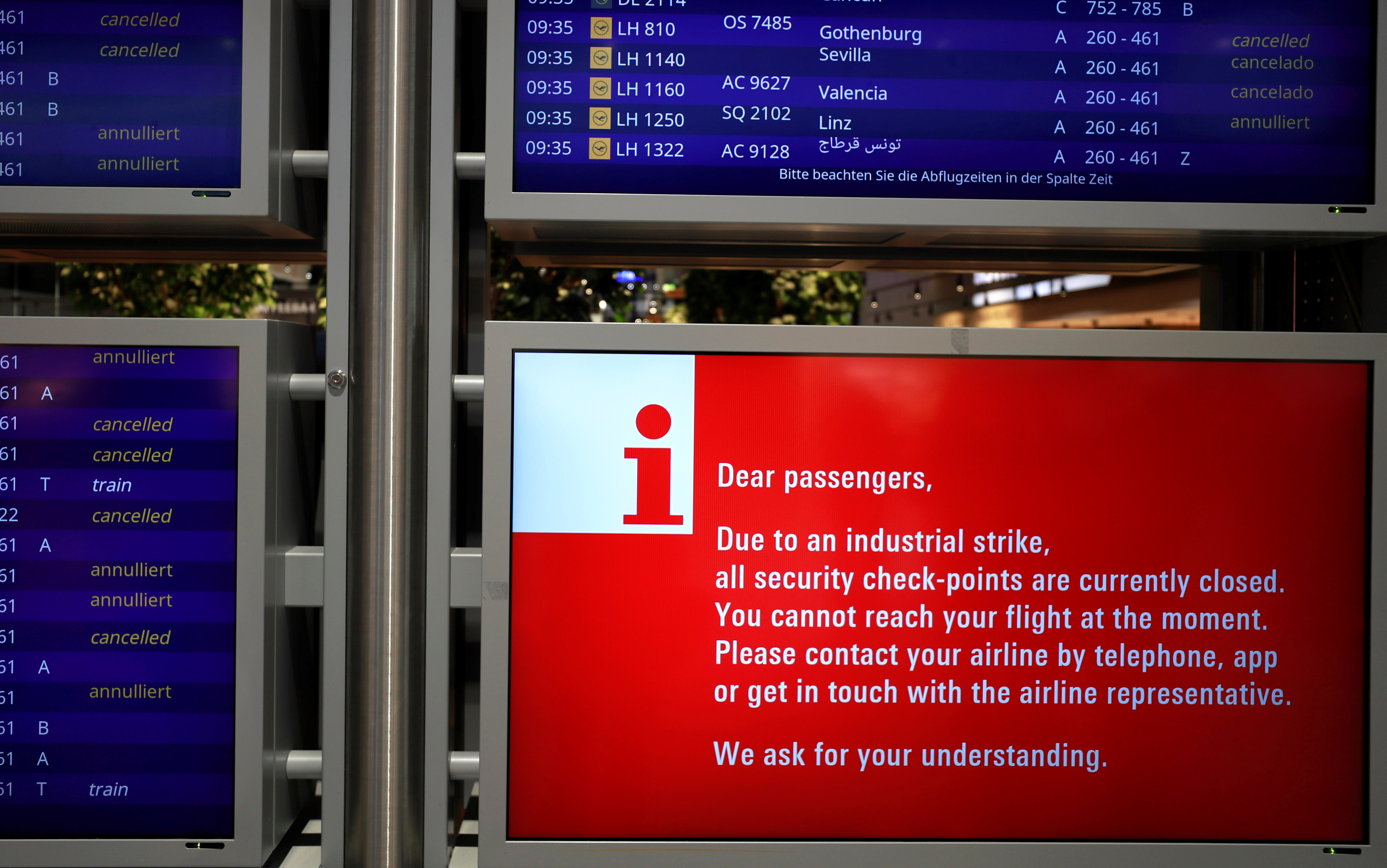 Information is displayed during a strike of security personnel over higher wages at Germany's largest airport in Frankfurt