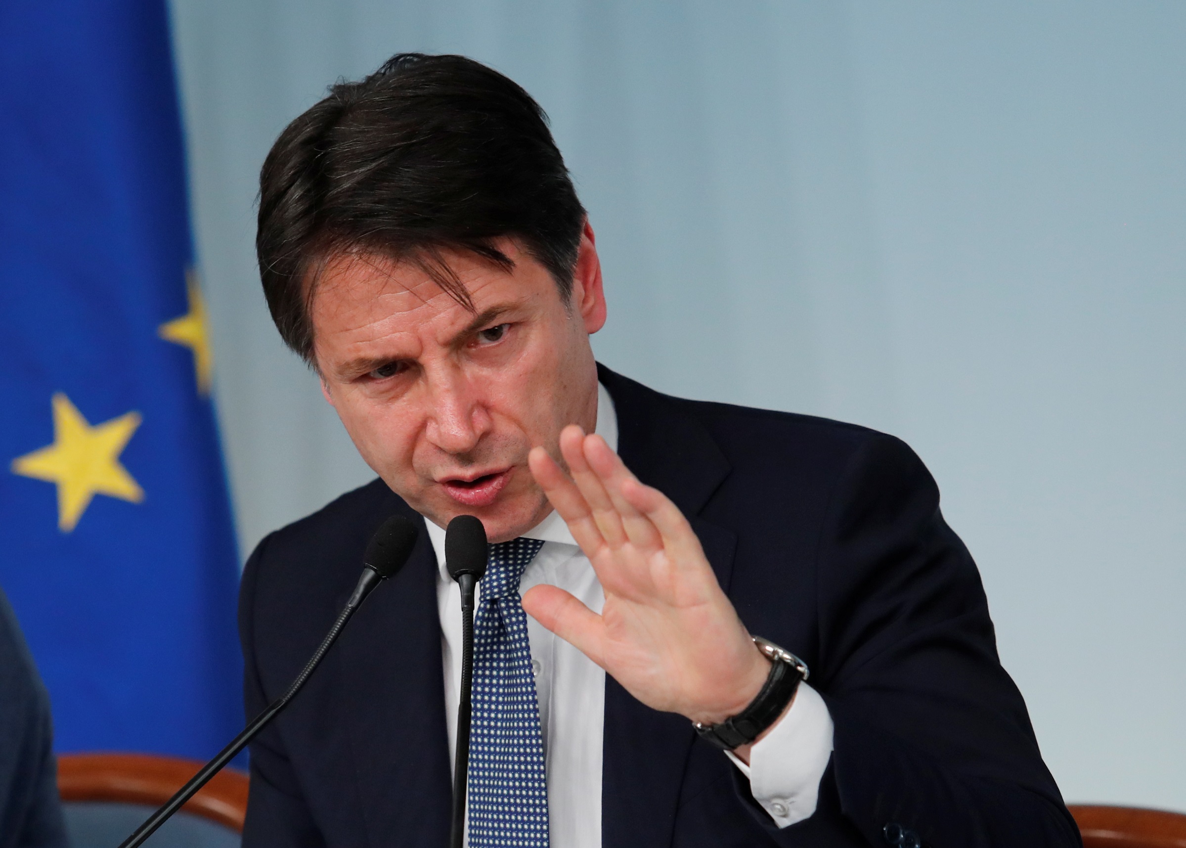 Italy's Prime Minister Giuseppe Conte attends a news conference regarding the return of former leftist guerrilla Cesare Battisti, in Rome
