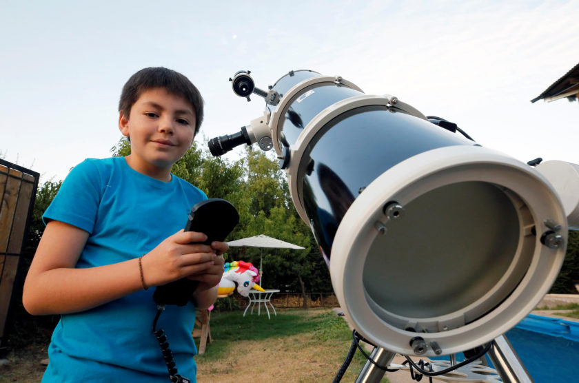 Ricardo Barriga, 10, poses for a picture during an interview with Reuters in Pirque