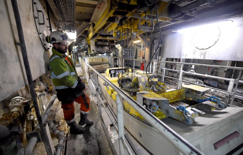 FILE PHOTO: A worker is seen in the tunnel of a high-speed train line, known as TAV (Treno Alta Velocita) in Saint-Martin-de-la-Porte