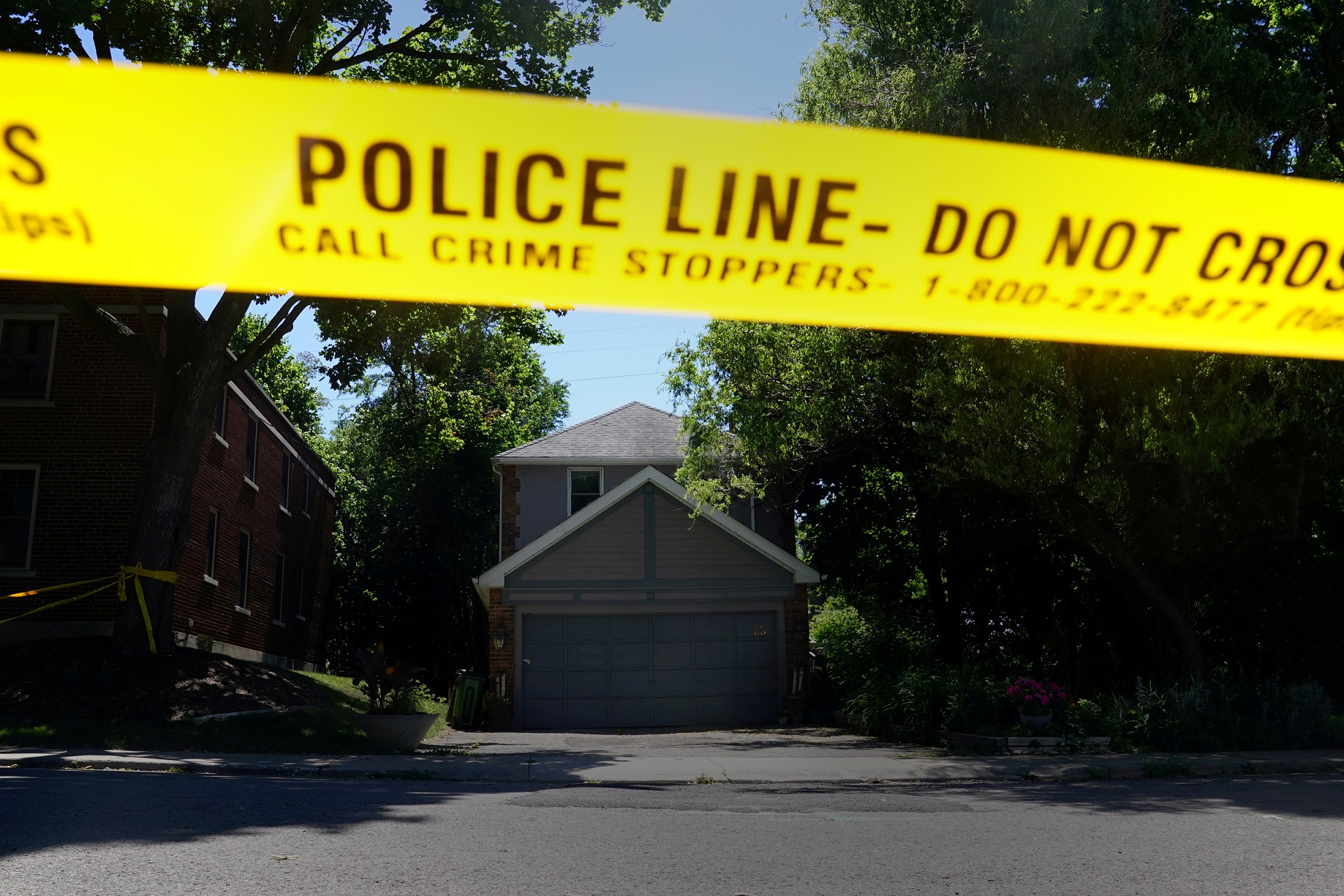 FILE PHOTO: Police investigate a home that accused serial killer Bruce McArthur worked at in Toronto