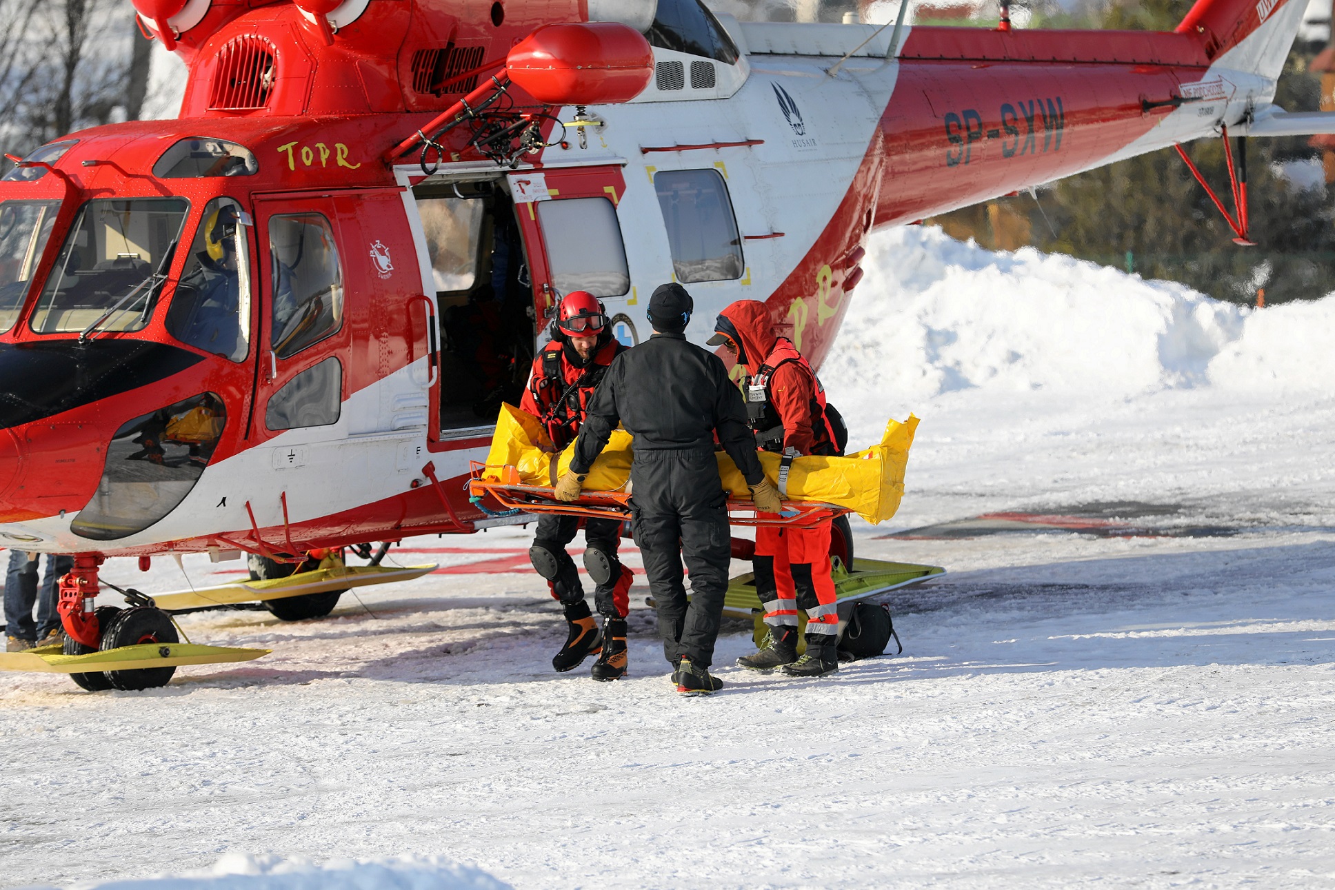 TOPR personnel transport injured people after avalanche in Tatra mountains, in Zakopane