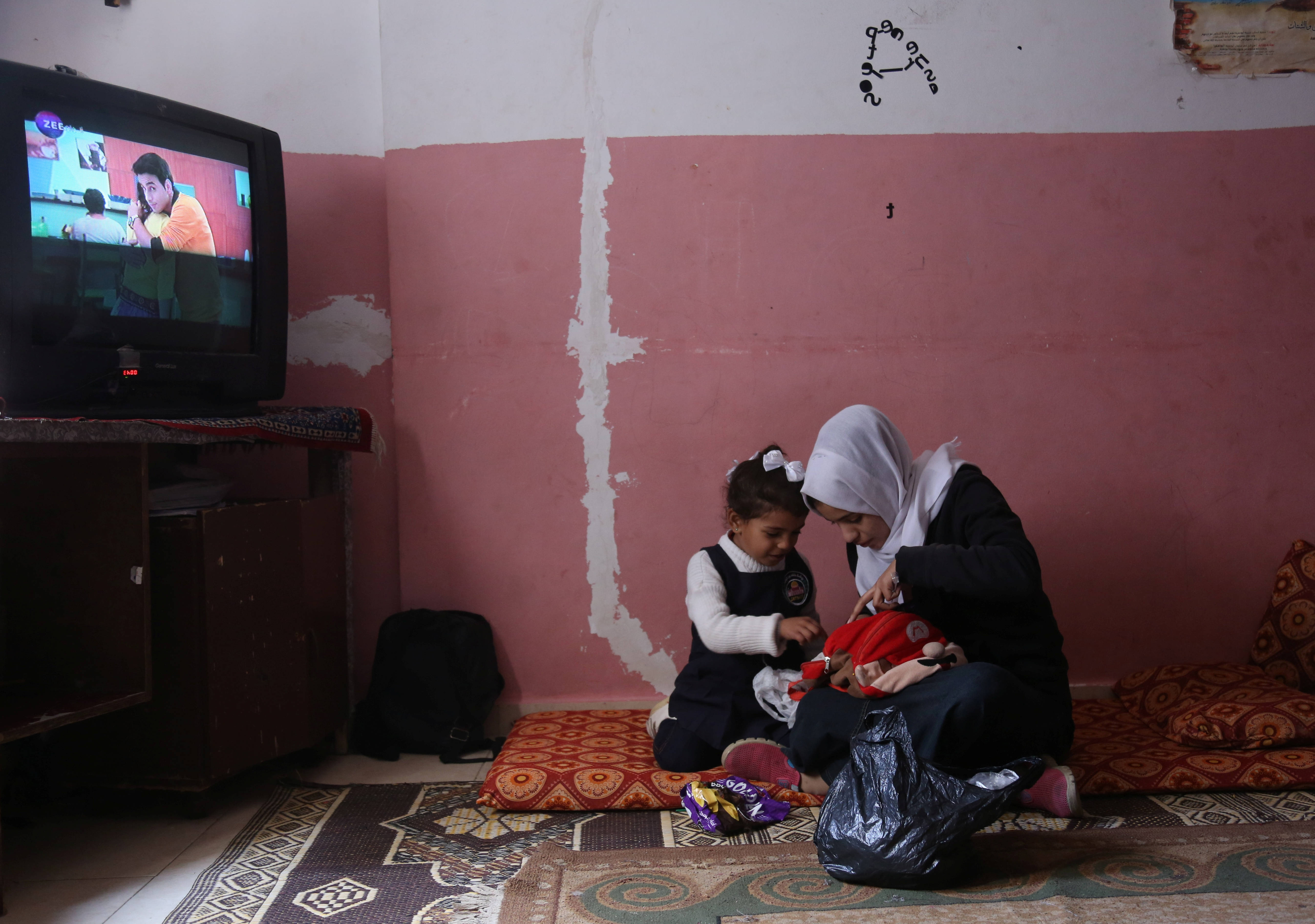 The Wider Image: In Gaza, women walk thin line between hope and despair
