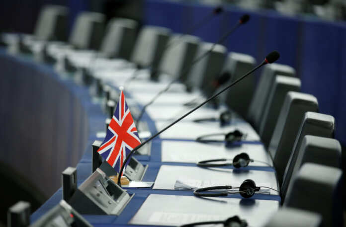 A British Union Jack flag is seen on the desk of a MEP ahead of a debate on Brexit, at the European Parliament in Strasbourg