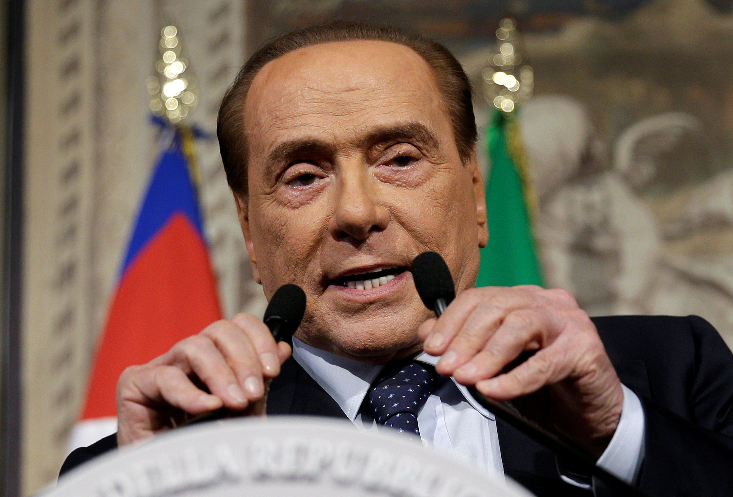 FILE PHOTO: Former Italian prime minister Silvio Berlusconi speaks after talks with President Sergio Mattarella at the Quirinale palace in Rome