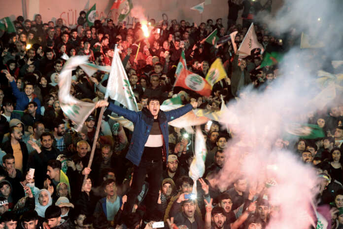 Supporters of pro-Kurdish HDP celebrate municipal elections results in Diyarbakir