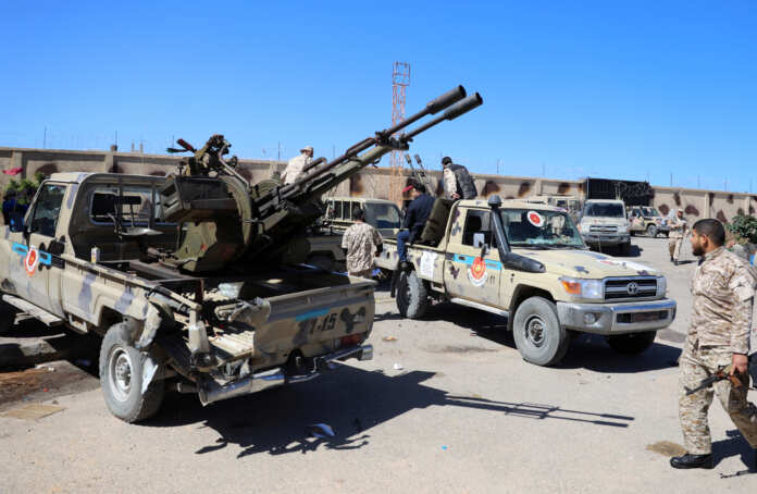 Military vehicles of Misrata forces, under the protection of Tripoli's forces, are seen in Tripoli