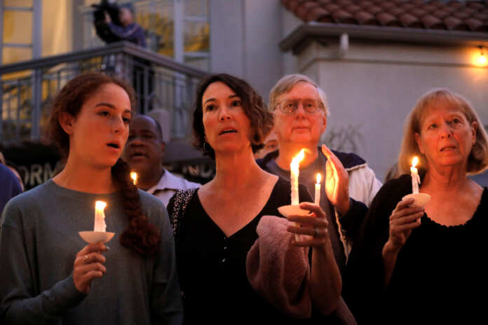 A candlelight vigil is held at Rancho Bernardo Community Presbyterian Church for victims of a shooting incident at the Congregation Chabad synagogue in Poway
