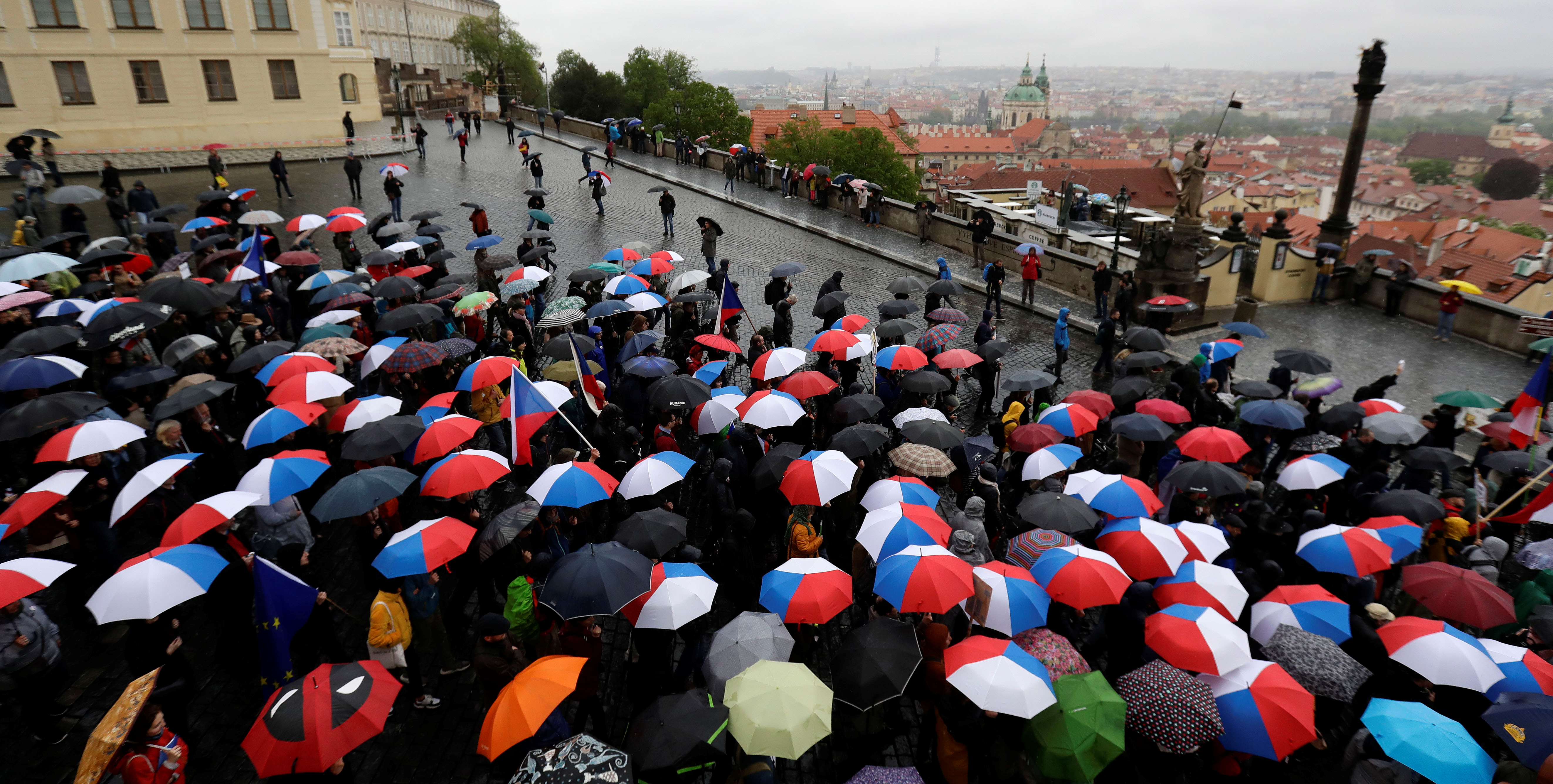 Demonstrators march during protest demanding resignation of Czech PM Babis in Prague