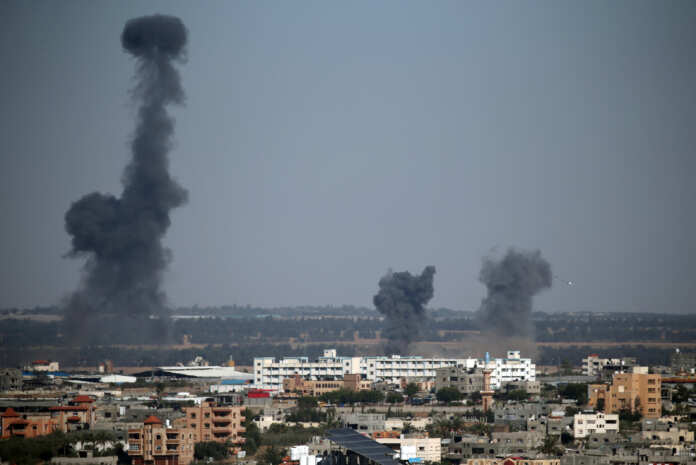 Smoke rises during Israeli air strikes in the southern Gaza Strip