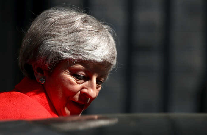 Britain's Prime Minister Theresa May is seen outside Downing Street in London Theresa May dejected, entering car