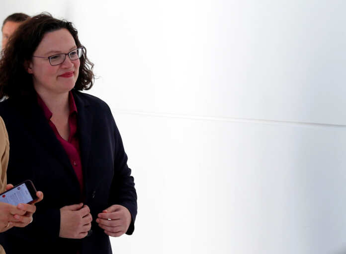 SPD party leader Andrea Nahles is pictured as she leaves a party faction meeting for a break at the lower house of parliament Bundestag in Berlin
