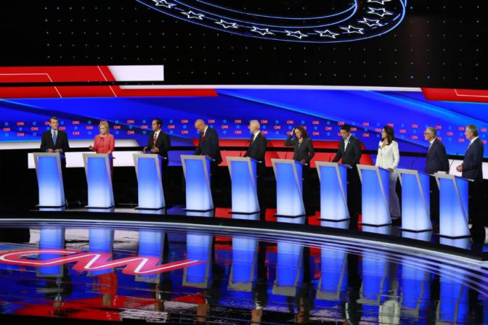 FILE PHOTO - Democratic 2020 U.S. presidential candidates pose together before the start of the second night of the second U.S. 2020 presidential Democratic candidates debate
