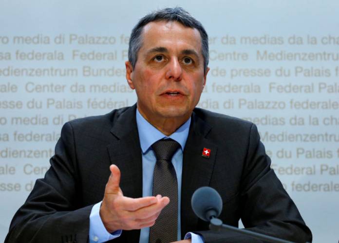 FILE PHOTO: Swiss Foreign Minister Cassis addresses a news conference in Bern