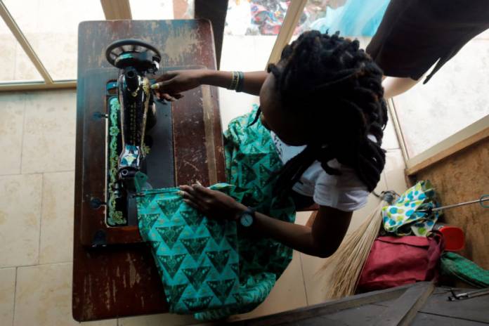 Woman works as a tailor in Benin City