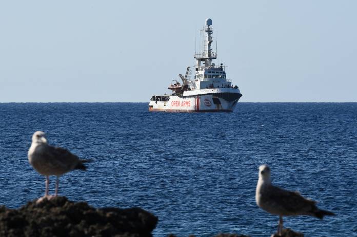 Spanish migrant rescue ship Open Arms is seen arriving close to the Italian shore as a Rome administrative court rules it can enter Italian territorial waters, in Lampedusa