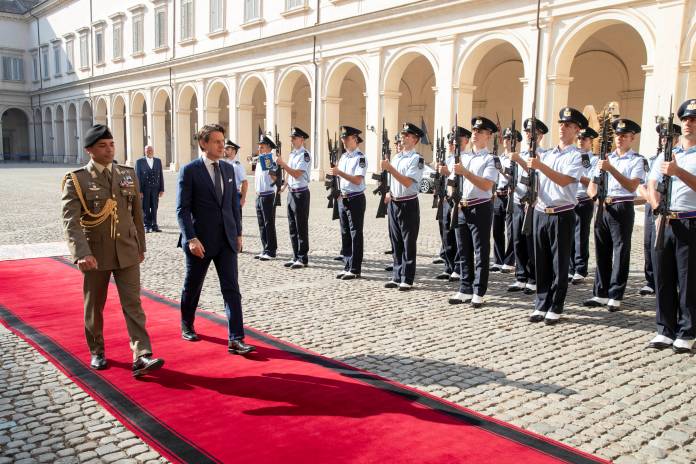 Italy's outgoing Prime Minister Giuseppe Conte arrives at the Quirinale Presidential Palace in Rome