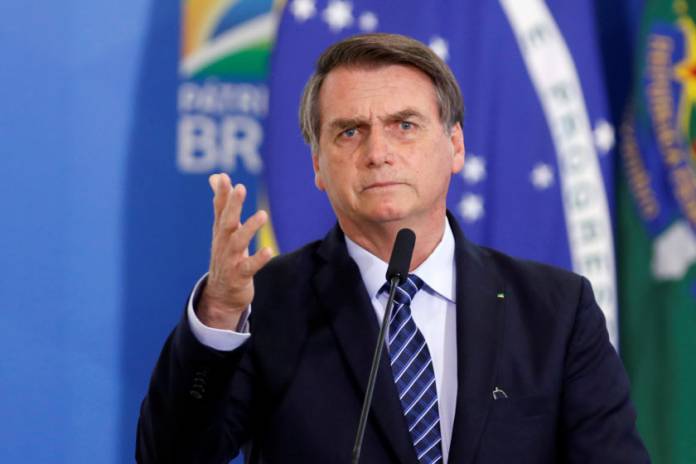 Brazil's President Bolsonaro speaks during a launching ceremony at the Planalto Palace in Brasilia