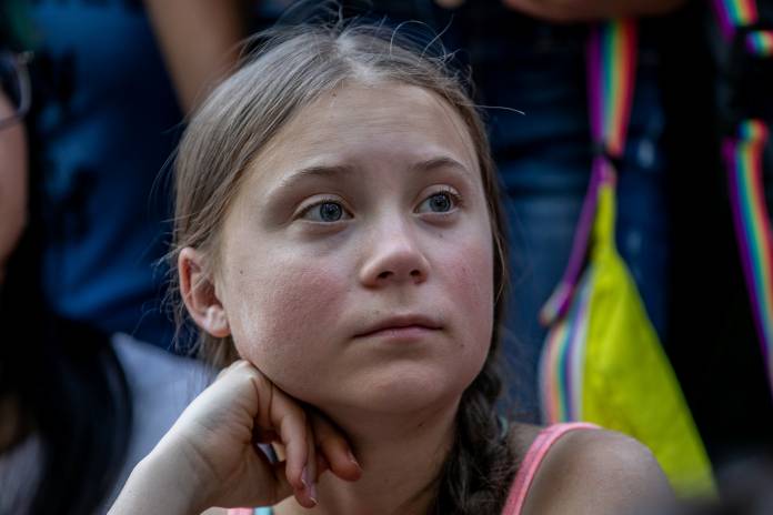 Swedish activist Greta Thunberg participates in a youth climate change protest in front of the United Nations Headquarters in Manhattan