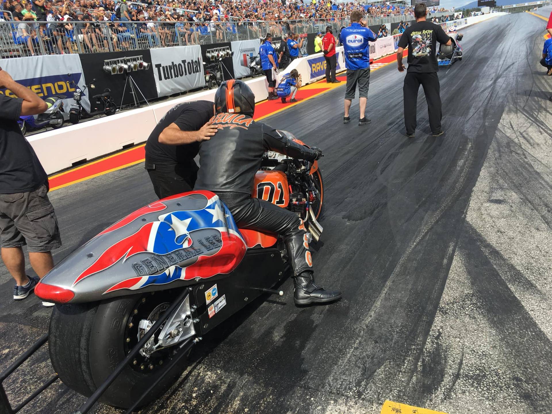 Success by local top fuel bike drag racing driver in Germany