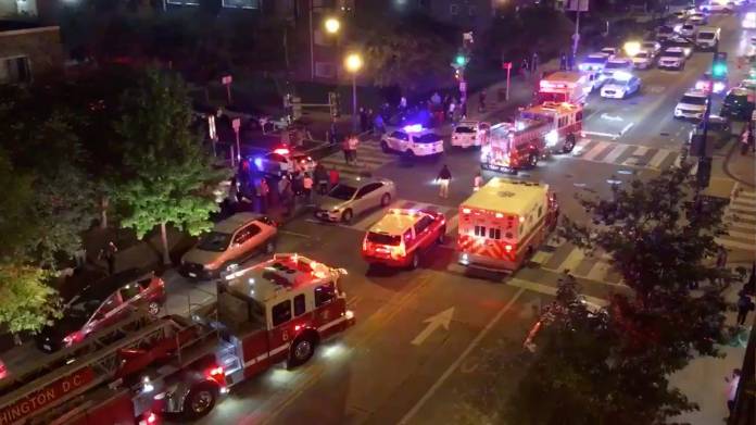 Rescue vehicles are seen following a shooting in Washington