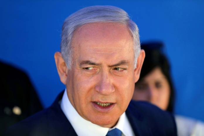 FILE PHOTO: Israeli Prime Minister Benjamin Netanyahu speaks during a cornerstone-laying ceremony for Mobileye's center in Jerusalem