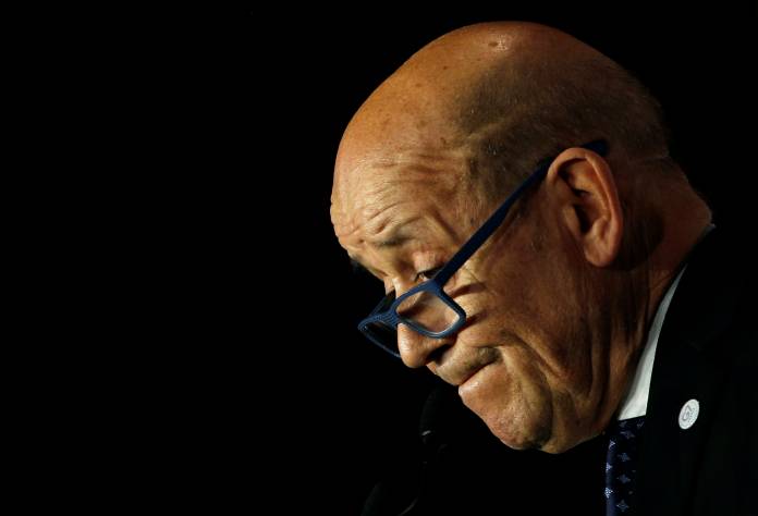 French Foreign Minister Jean-Yves Le Drian attends a news conference during the Foreign ministers of G7 nations meeting in Dinard