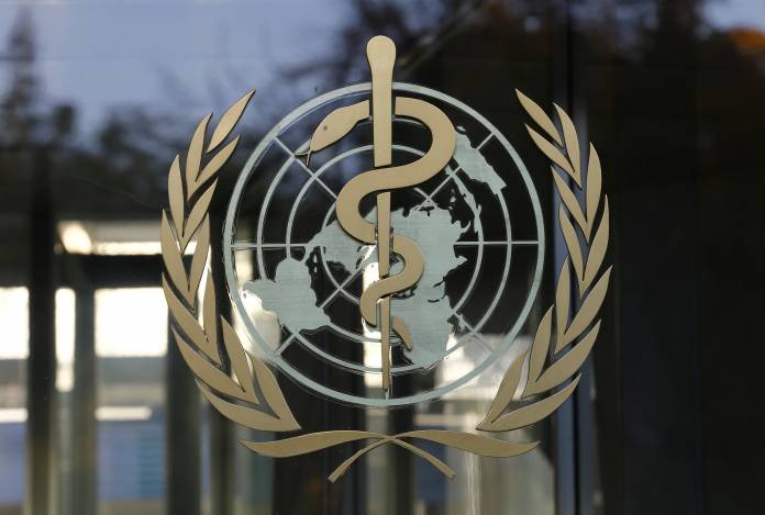 A logo is pictured on the World Health Organization headquarters in Geneva