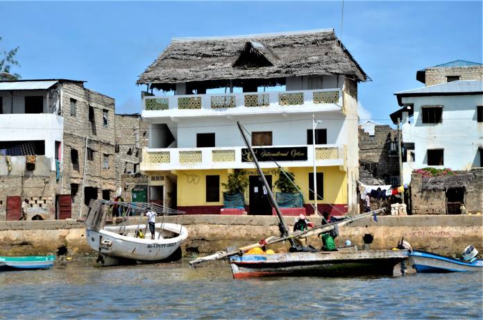 Boats bob in the water at Lamu island, a UNESCO World Heritage site and tourist island known for being one of the world's oldest Swahili settlements