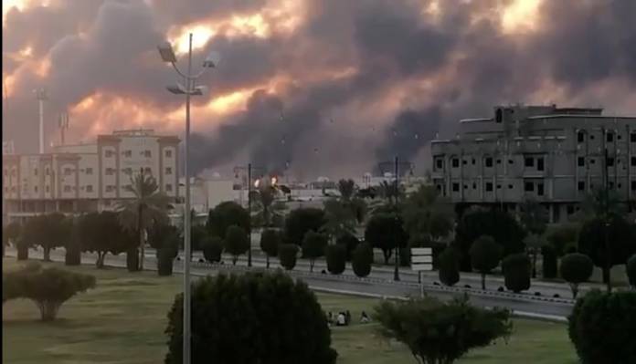 Smoke is seen following a fire at an Aramco factory in Abqaiq